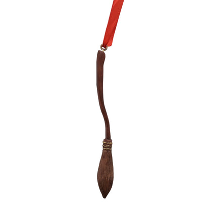 Resin broom tree decoration with red hanging ribbon, brown handle and bristles