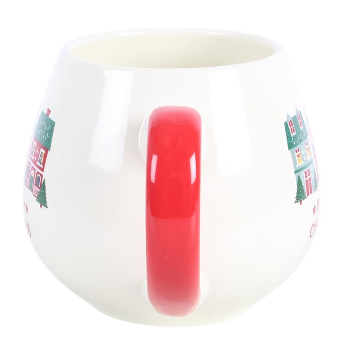 White Christmas mug with red interior base and house-print panels.