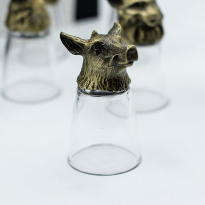 Antique bronze wolf-head bottom-up shot glass with clear glass body