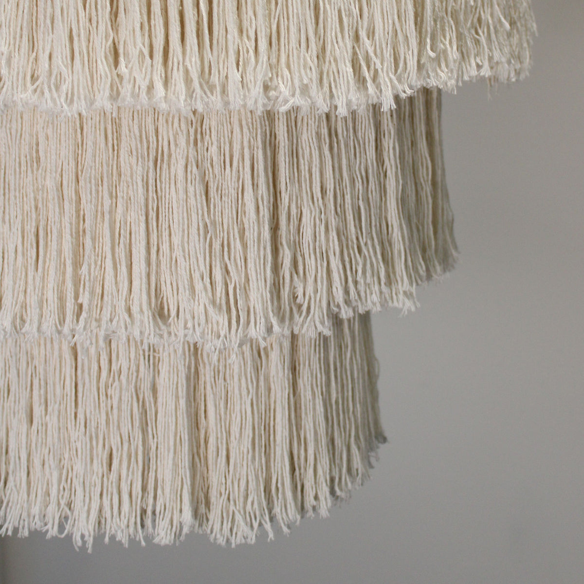 Natural macrame chandelier shade with vertical tassel fringe edge