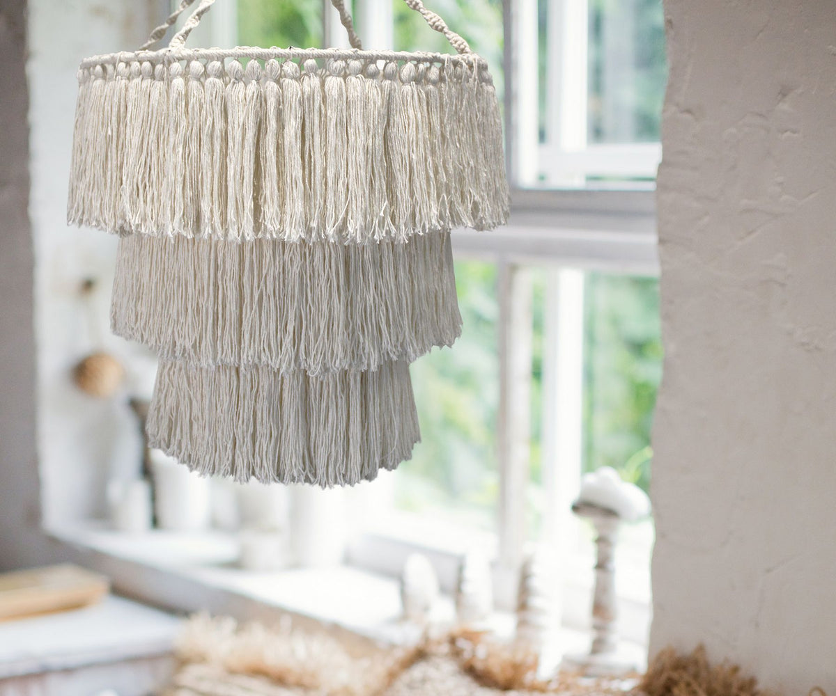 Natural macrame chandelier with layered tassel shades and three braided suspension cords
