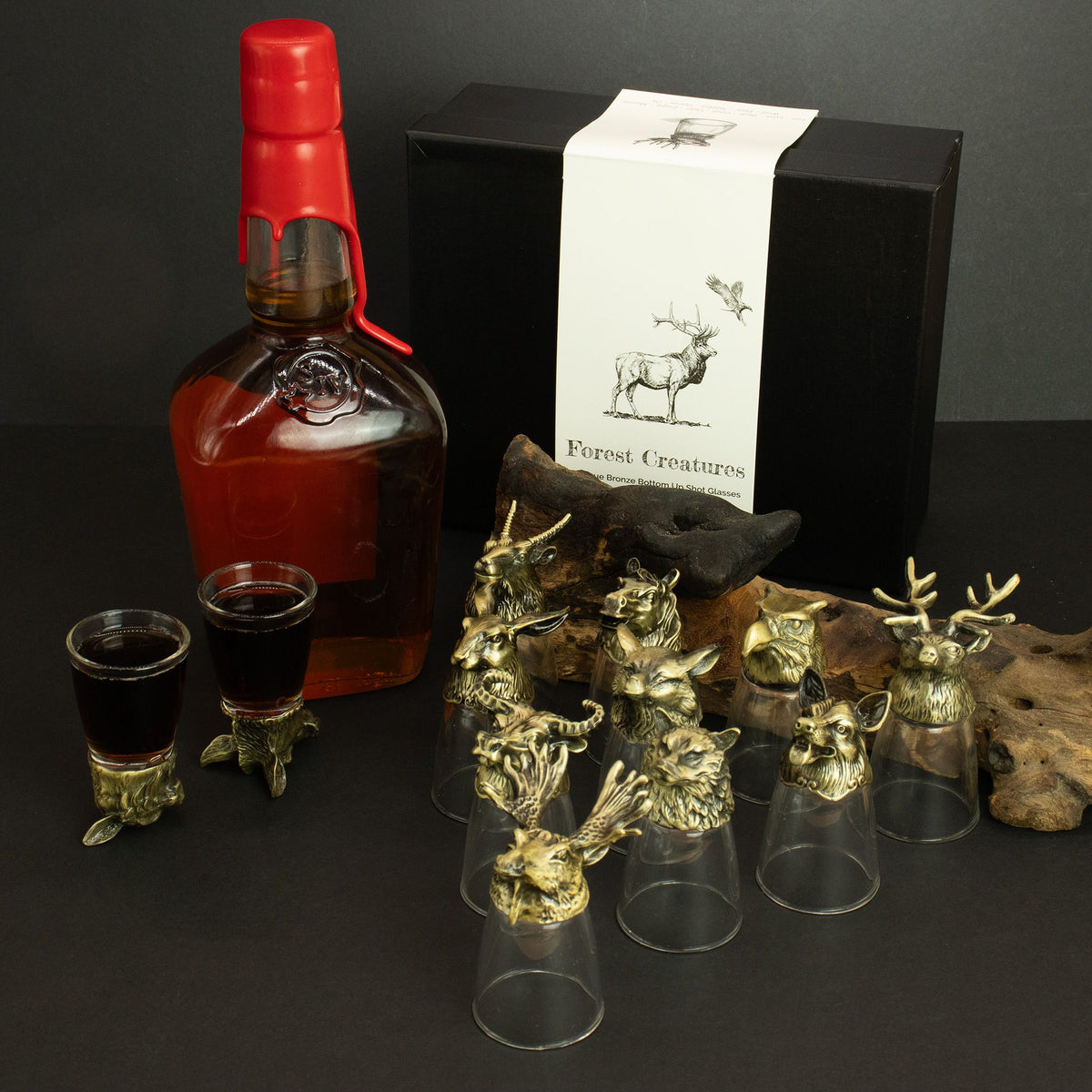Gift set of forest creature shot glasses with antique bronze toppers and clear bases