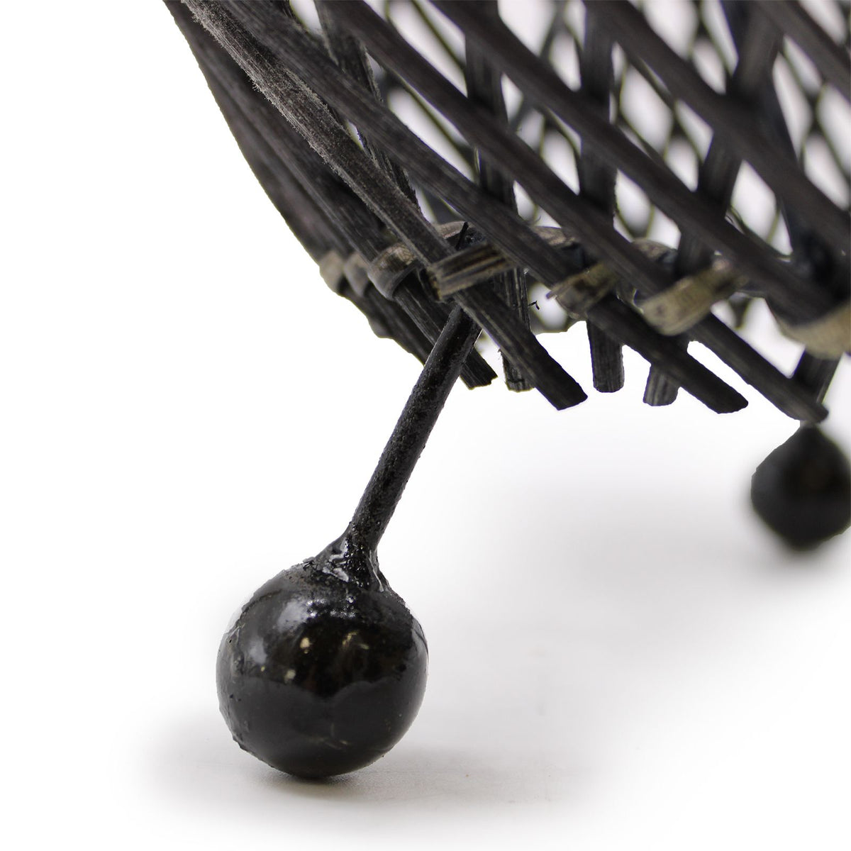 Black rattan lamp base with three glossy feet