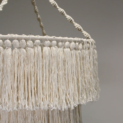 Natural macrame chandelier with round fringed shade and three hanging cords