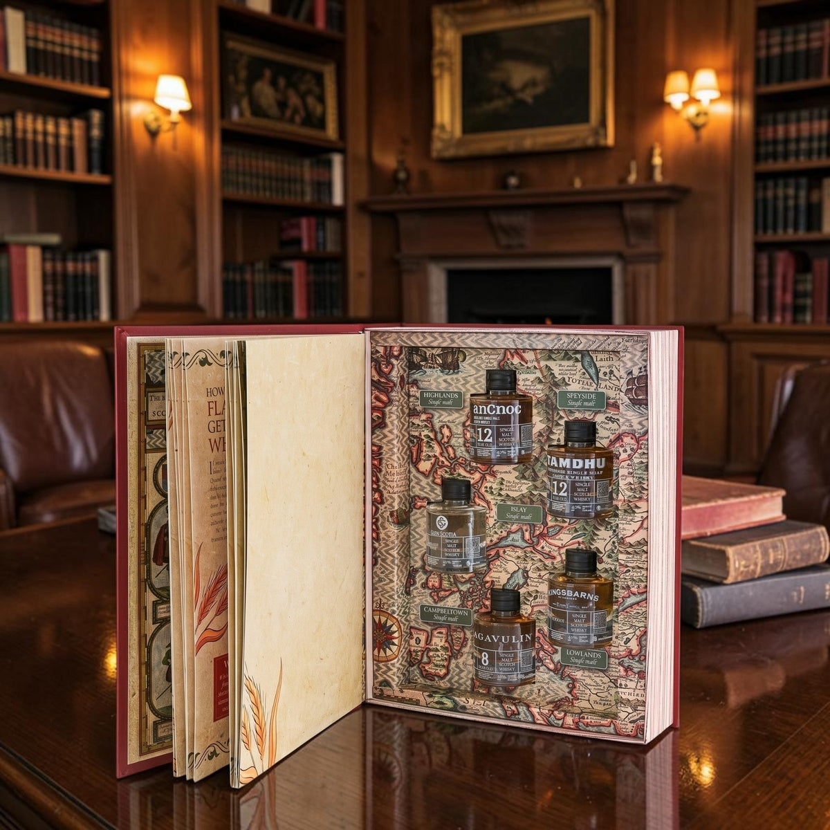 Whisky gift set book open to illustrated single malt tasting page on a tabletop