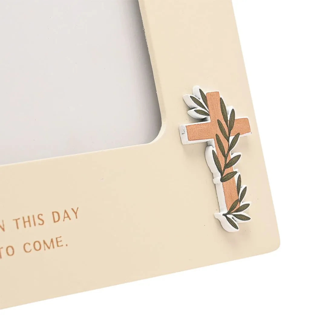 Photo frame corner with leaf and cross-style floral embellishment