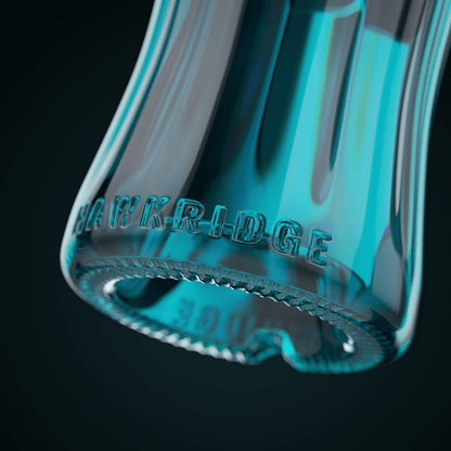 Teal glass bottle base with embossed text and decorative rim detailing