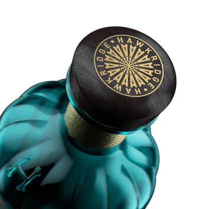 Black screw-top cap with gold Hawkridge crest seal