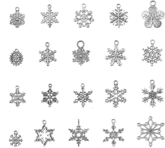 Silver plated snowflake stud earrings set, five silver snowflake designs shown