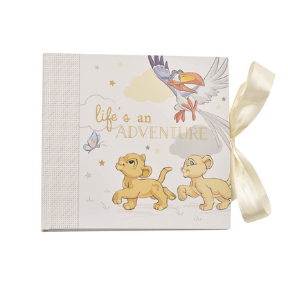 Photo album with Simba and lion cubs cartoon cover, "Life's an Adventure" title