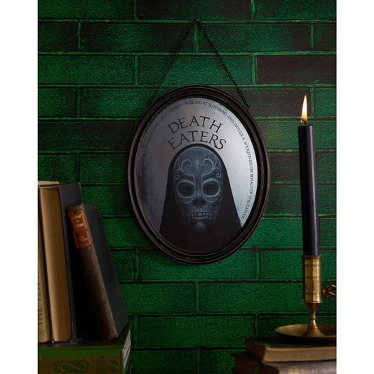 Oval mirrored plaque with DEATH EATERS skull emblem, dark frame, hanging