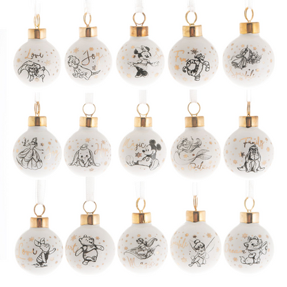 White ceramic baubles with gold caps and character line art, hanging set