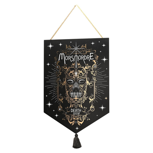 Dark hanging pendant with gold skull emblem, text, star accents, and tassel cord