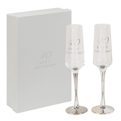 Set of 2 champagne flutes with "40 Ruby Anniversary" engraving and chrome bases