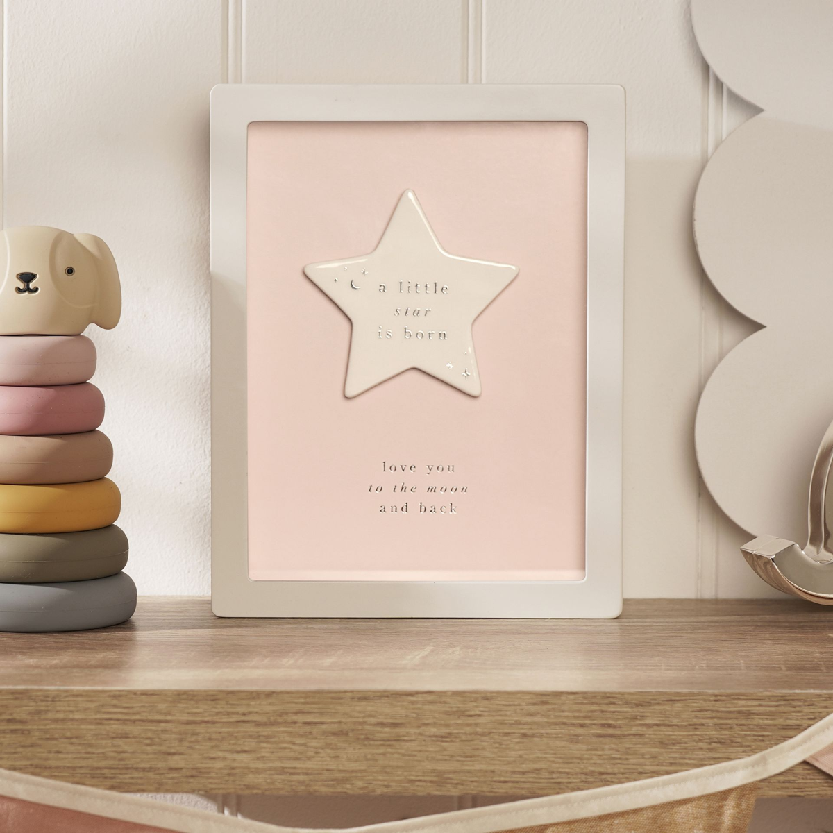 Pink framed baby plaque with raised star and engraved birth text