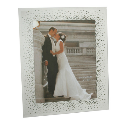Wedding photo mirror frame with crystal-studded starburst border and couple portrait
