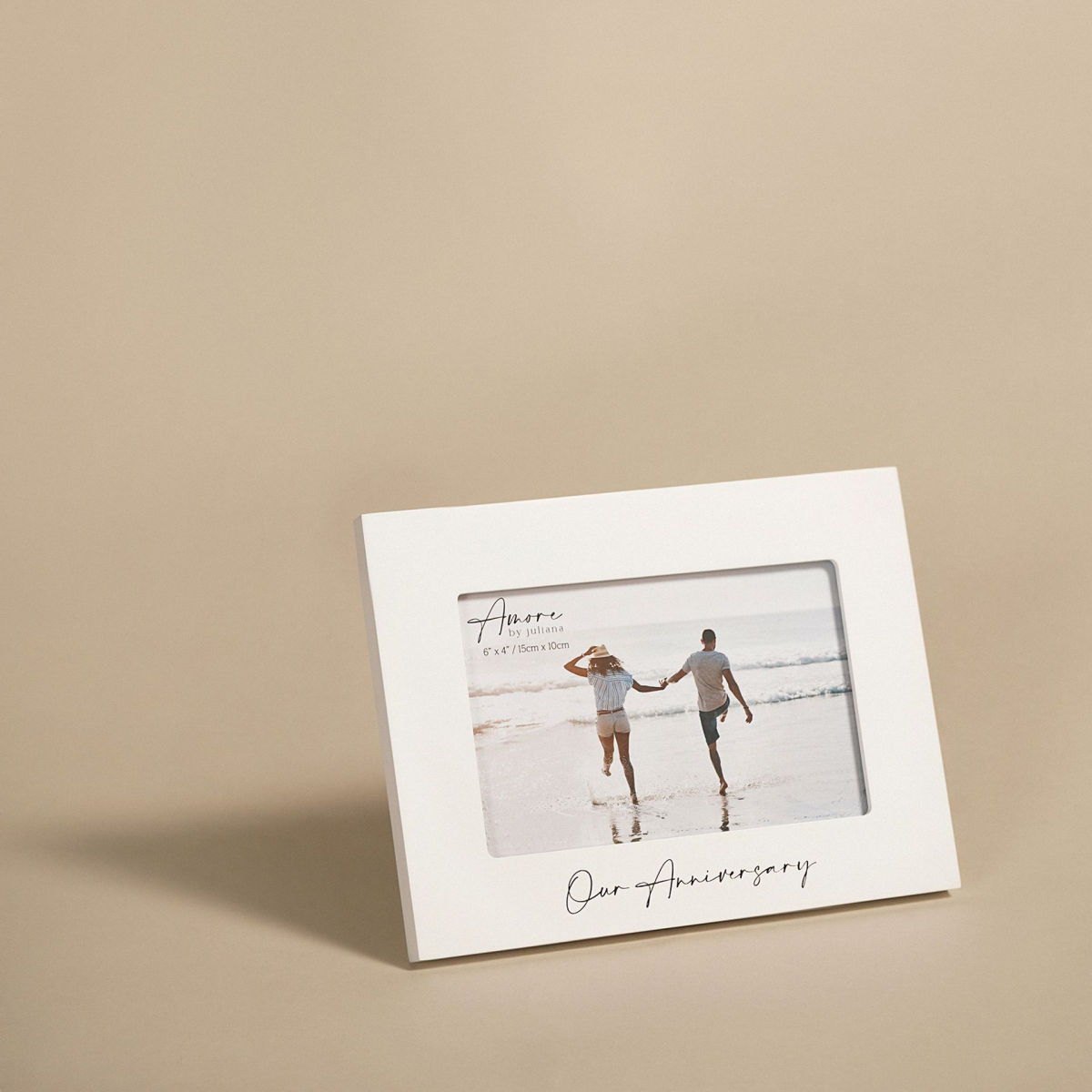 White 6x4 anniversary photo frame with beach couple photo and 'Our Anniversary' text