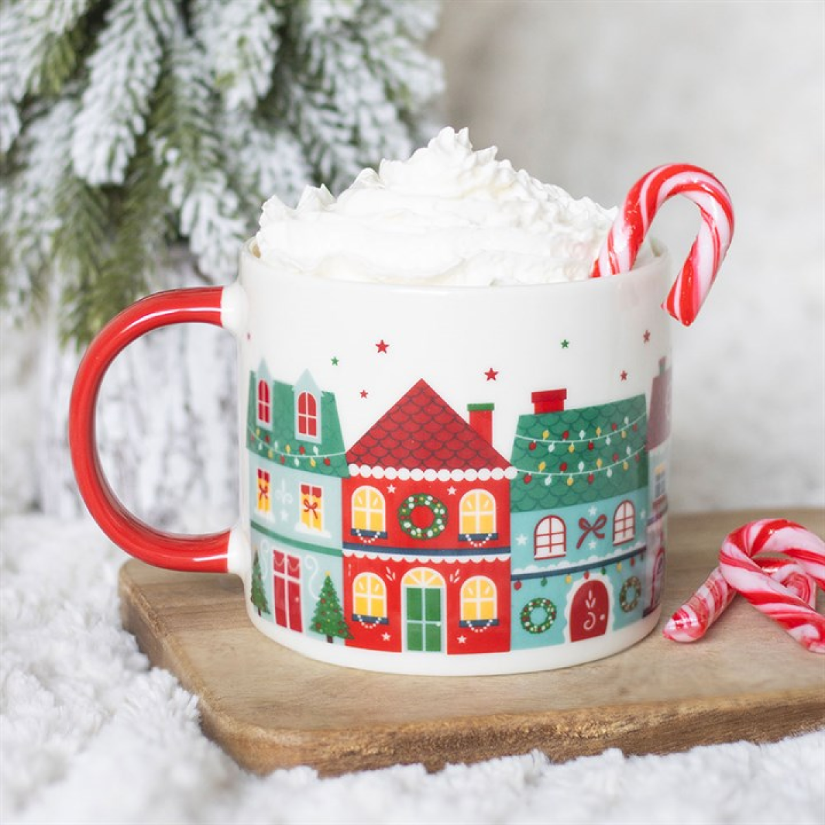 Christmas street scene mug with red handle and candy-cane accent