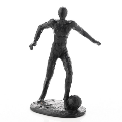 Dark footballer figurine standing pose with soccer ball at the base