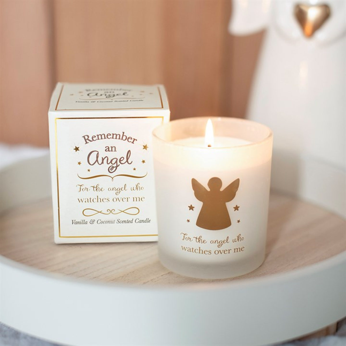 Vanilla & coconut scented candle in white glass with gold angel and star design