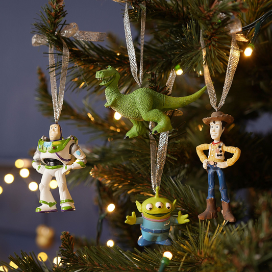 Set of 4 hanging character ornaments: green dinosaur, astronaut, alien, and cowboy