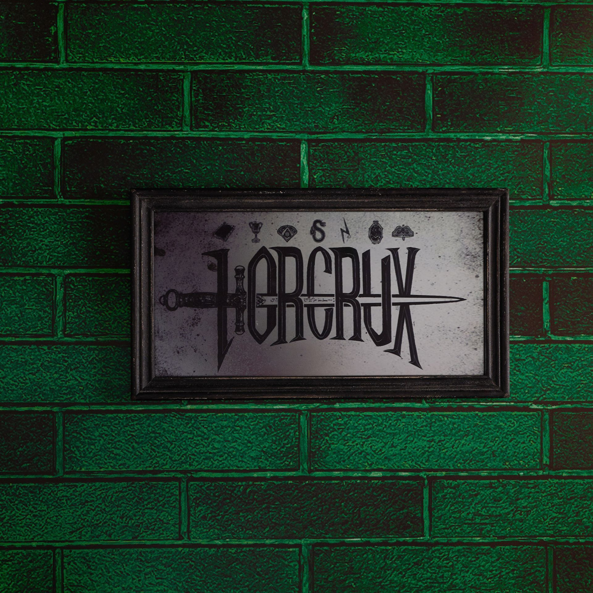 Black framed mirrored plaque with dark 'HORCRUX' lettering and symbols