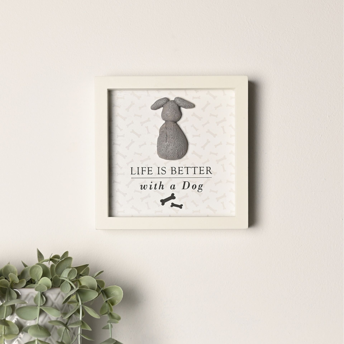 White framed wall plaque with gray dog figure and text: Life is better with a Dog