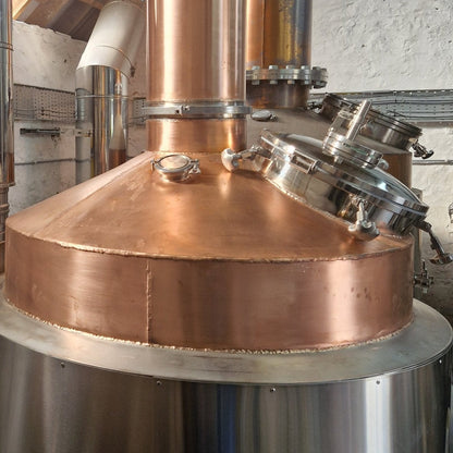 Copper distillation still top with connected stainless pipework