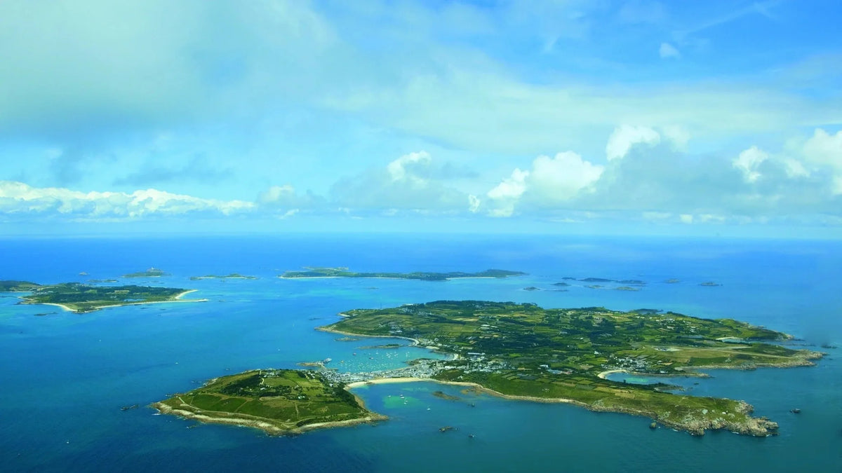 Coastal aerial view with islands and blue water
