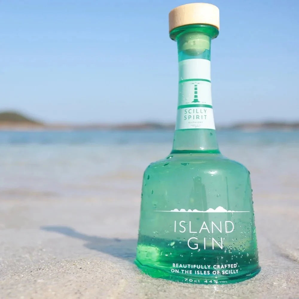 Island gin bottle in teal glass with cork top and front “ISLAND GIN” label