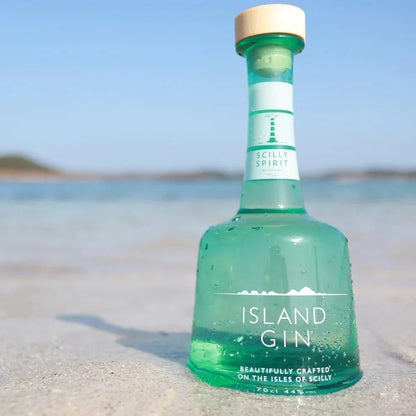 Island gin bottle in teal glass with cork top and front “ISLAND GIN” label