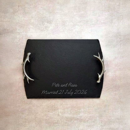 Dark slate serving tray with silver antler handles and engraved names/date.