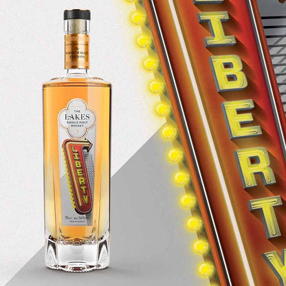 The Lakes Liberty whisky bottle with front label and Liberty backdrop