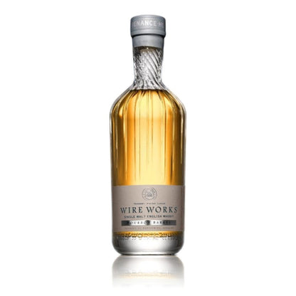 Bourbon barrel single malt whisky bottle, amber glass with silver neck label