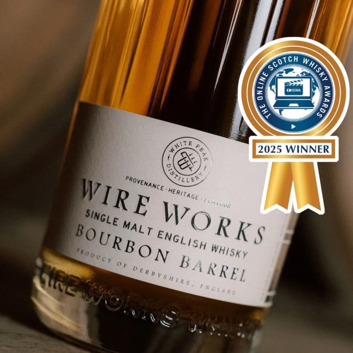 Bourbon barrel whisky bottle label close-up with 2025 winner badge